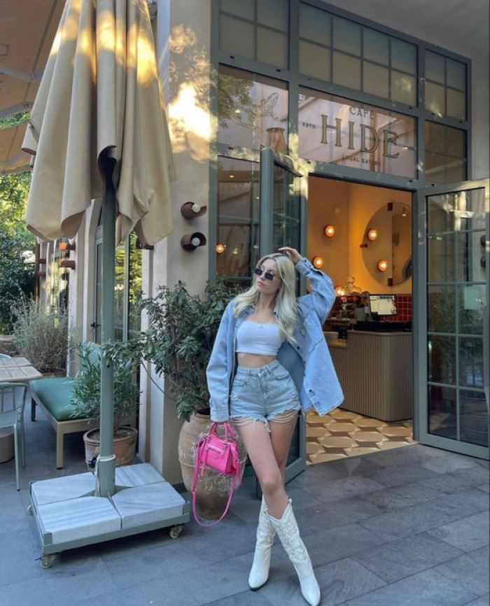 Denim Jacket with White Crop Top with white cowboy boots