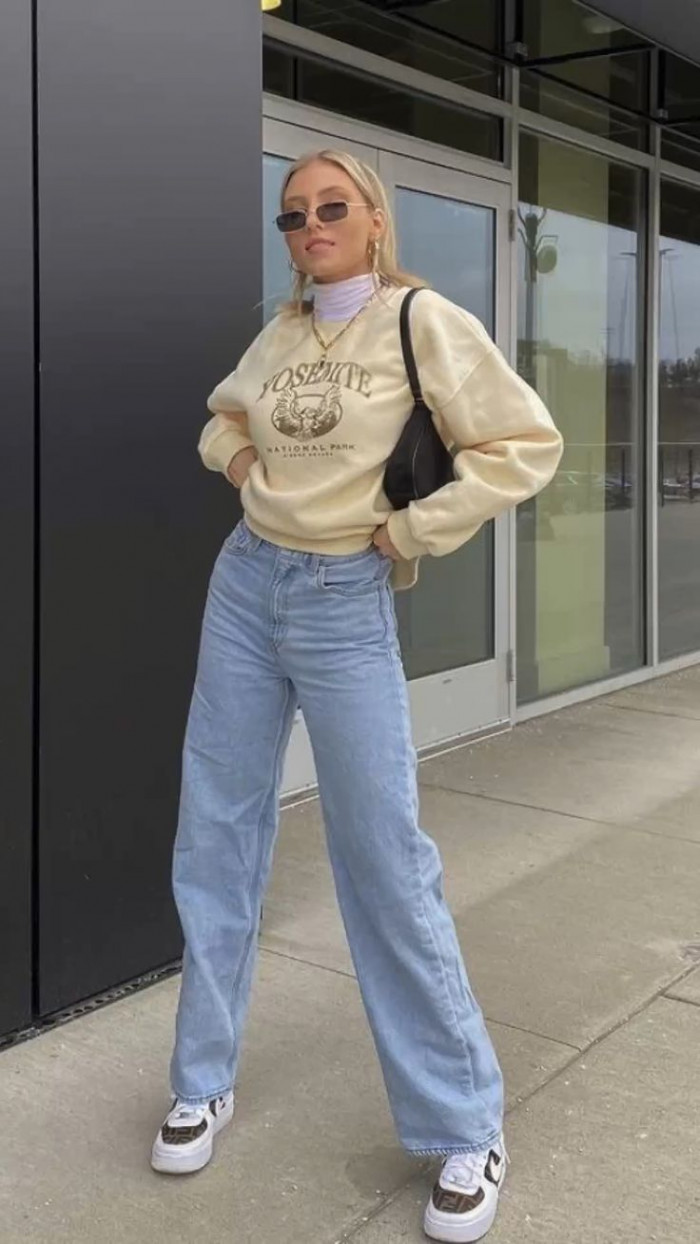 Graphic Sweatshirt with Light Blue Jeans